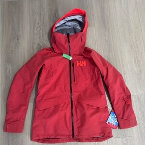 BRAND NEW Helly Hansen coat (W Aurora Infinity Shell Jacket). Women’s Large